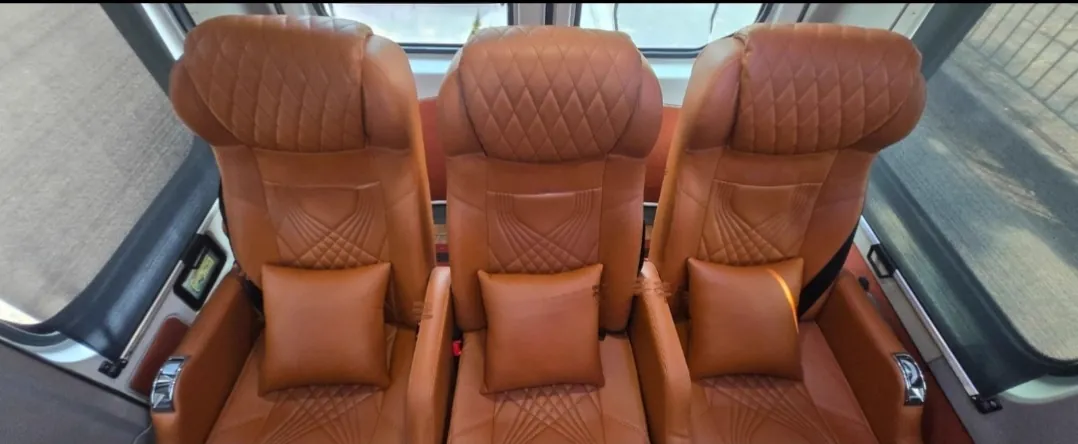 10 seater Maharaja Urbania, tan leather seats